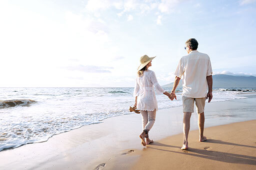 Couple walking on the beach